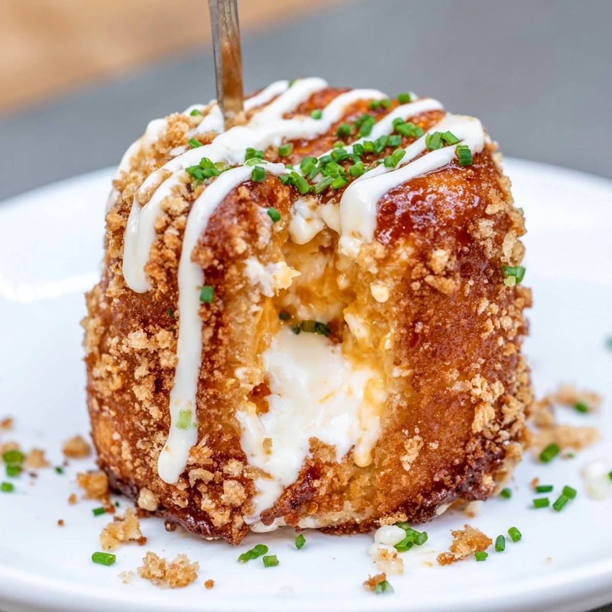 Delicious Cheesy Pretzel Buffalo Ranch Churro Cake Pancake Pops served warm with cinnamon sugar.