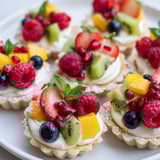 Vibrant heart-shaped fruit tart board, overflowing with berries and creamy filling, perfect dessert.