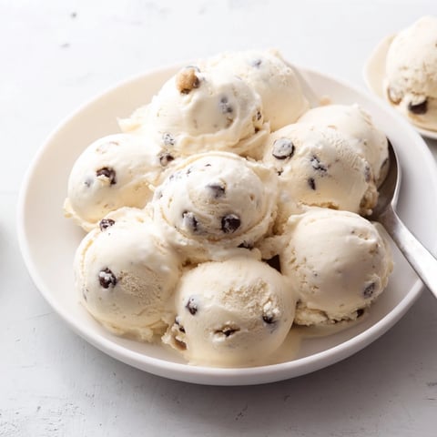 Creamy cottage cheese ice cream with cookie dough bites for a healthy dessert.  