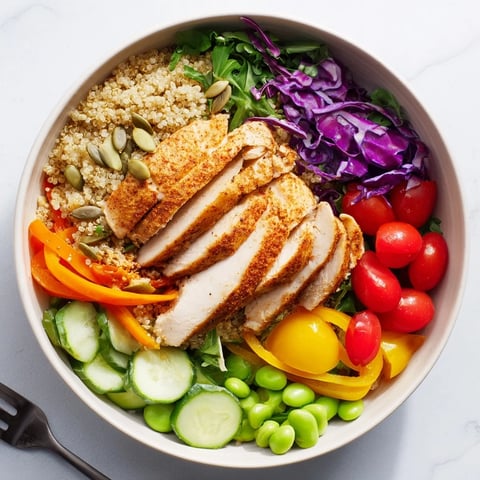Vibrant Healthy Meal-Prep Bowls showcasing colorful veggies and grilled chicken strips.  