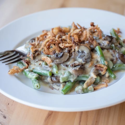 Creamy Old-School Green Bean Casserole baked with crispy onions, a holiday classic.  