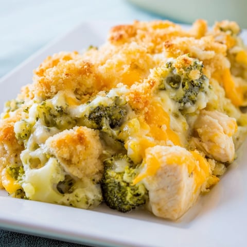 Golden, bubbly cheddar broccoli chicken bake, a comforting casserole with melted cheese and tender chicken.