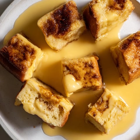 Golden-brown French Toast Bake, a comforting breakfast casserole soaked in cinnamon-vanilla custard.