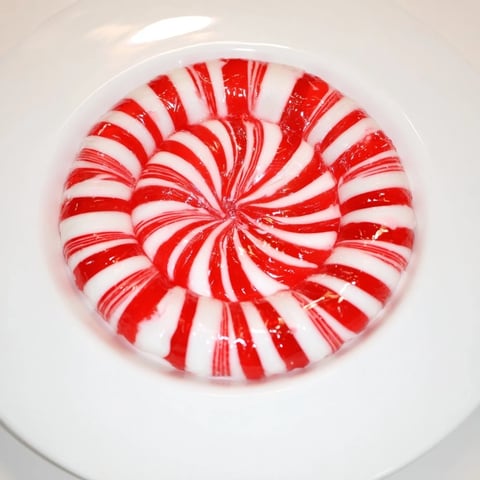 Melted peppermint candies transform into a festive No-Bake Peppermint Candy Bowl, ready for holiday treats.