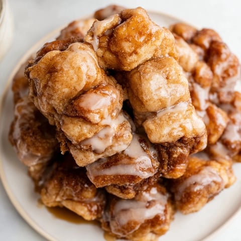 Fluffy Easy Christmas Morning Monkey Bread, glistening with a sweet glaze, ready to serve on a festive table.
