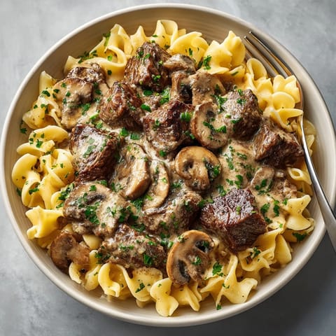 Family dinner: Slow cooker beef stroganoff, tender beef, dolloped with sour cream goodness.