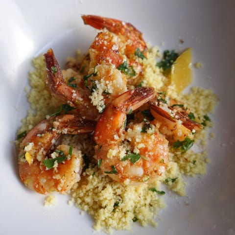 Creamy Shrimp Parmesan Couscous: A savory dish featuring tender shrimp and cheesy couscous.