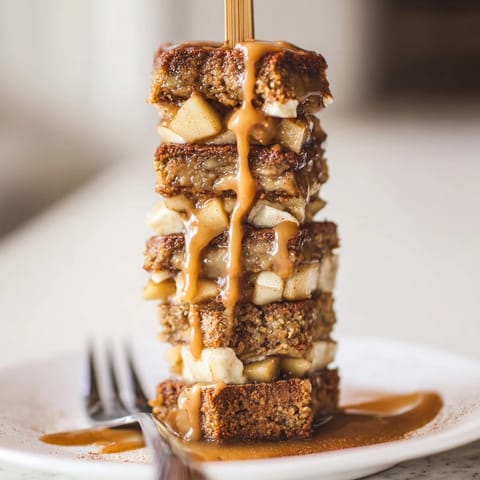 Whimsical skewers of chai cheesecake cake layered with tender caramelized apples.  