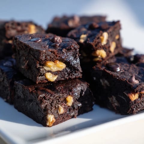 Decadent zero-waste brownies made from leftover nut-milk pulp, perfect for dessert lovers.  