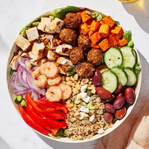 Guests create personalized plates with grilled chicken, tofu, and fresh vegetables.  