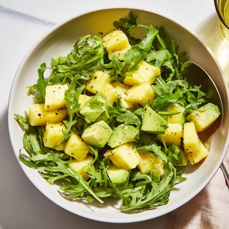 Chilled Pineapple Avocado Summer Salad, a refreshing vegan dish for warm days.