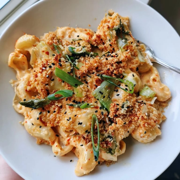 Delicious Spicy Kimchi Mac & Cheese, a comforting dish with spicy flavor and crunch.